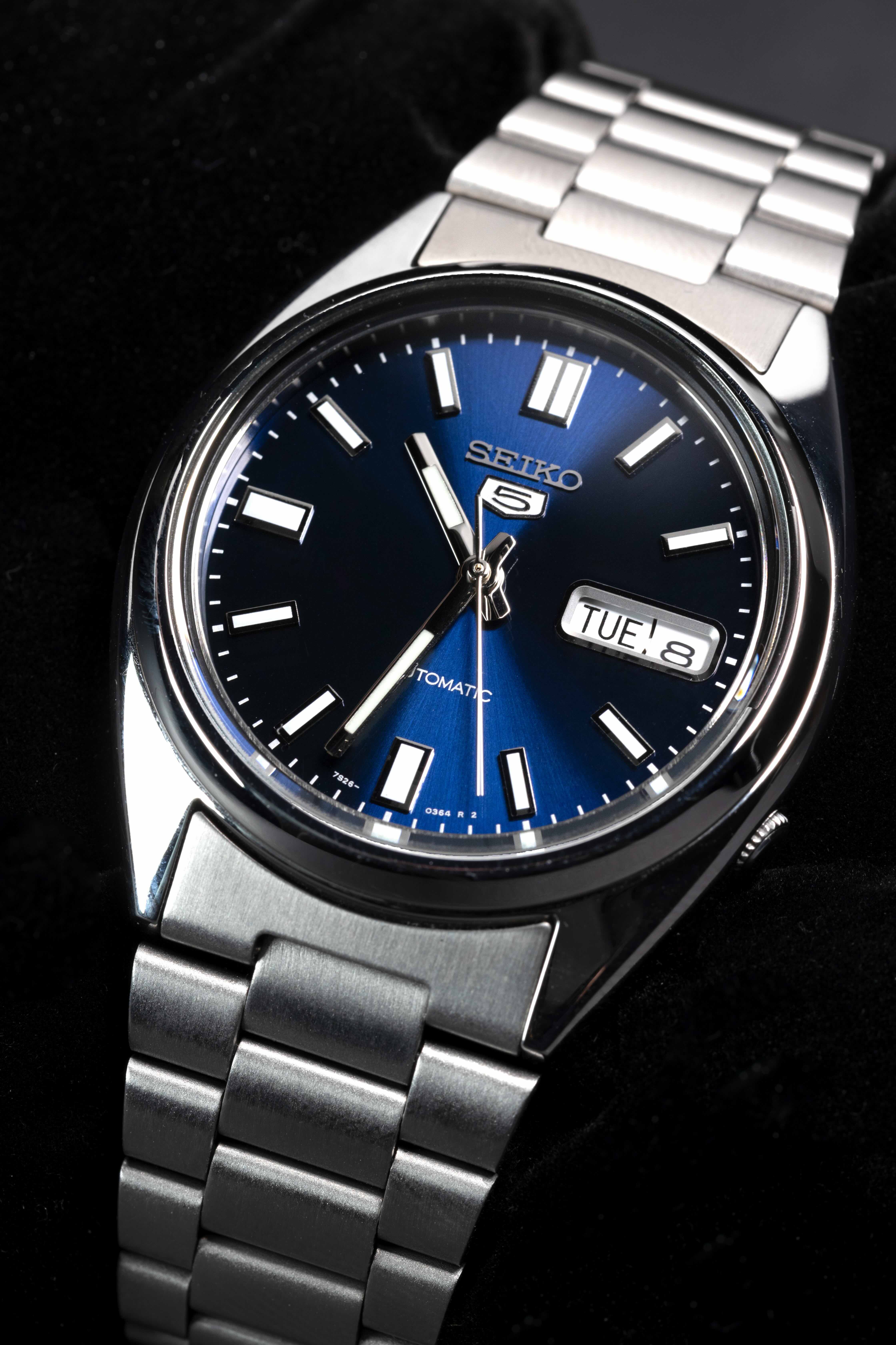 Seiko wristwatch, side profile with reflection